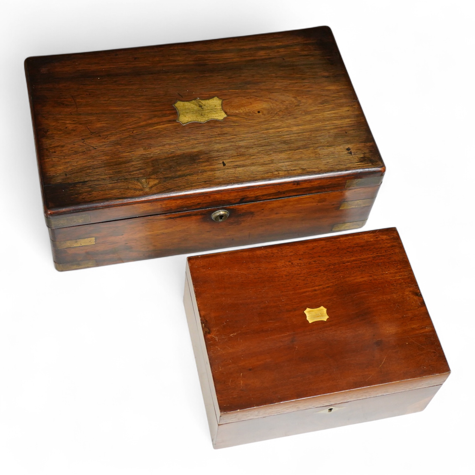 A Victorian brass inlaid mahogany jewellery box and one other writing slope, lacking interior, 40cm wide